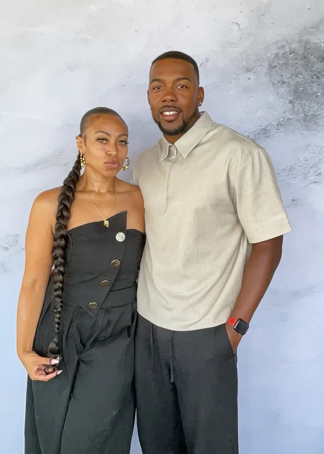 Couple posing together at N.J.'s milestone birthday celebration
