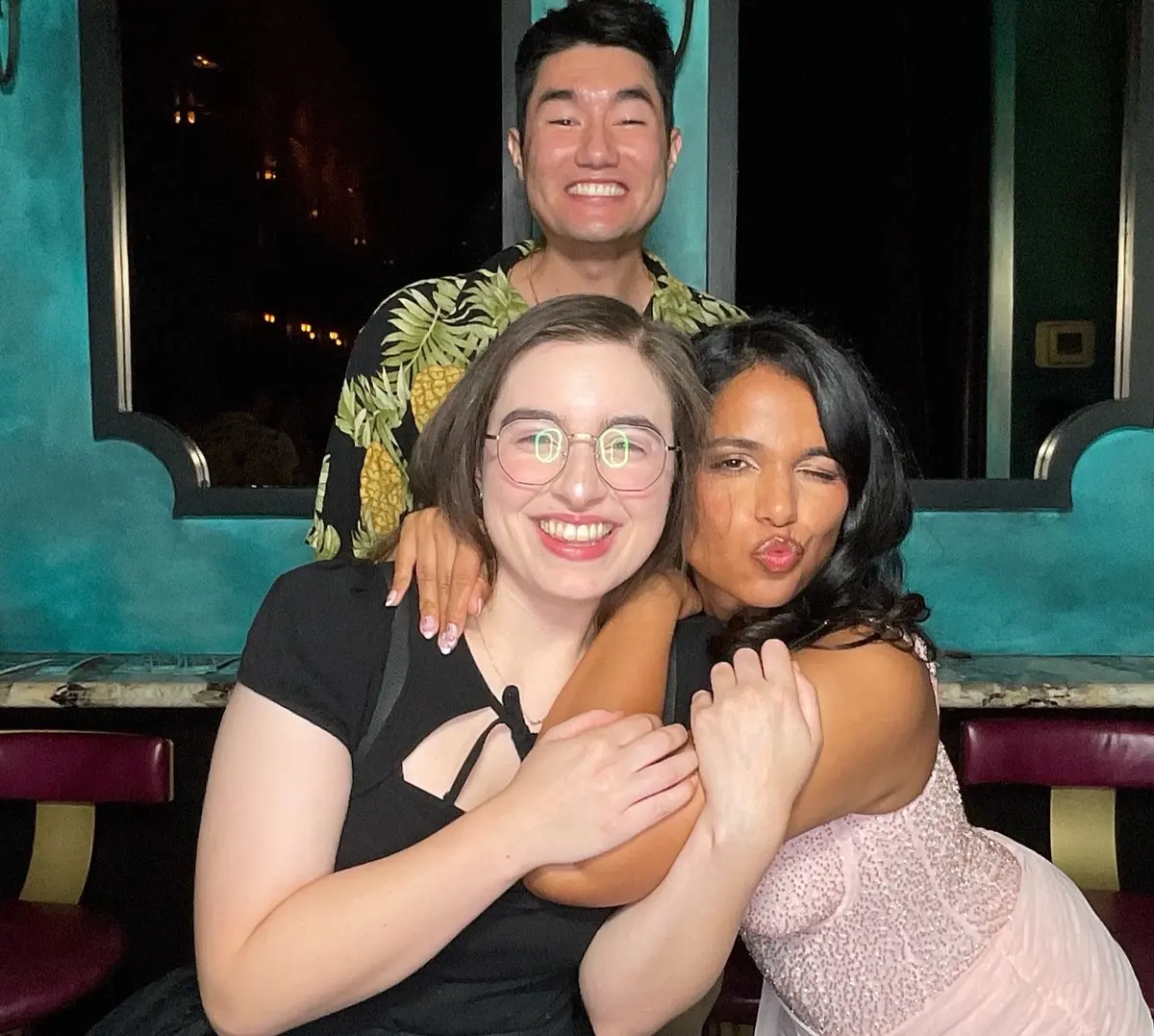 Friends celebrating a 30th birthday with colorful photo booth props, image 1