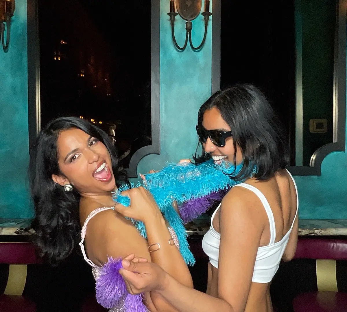 Friends celebrating a 30th birthday with colorful photo booth props, image 5