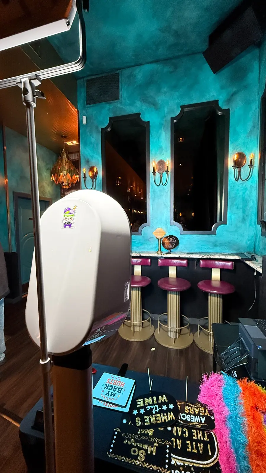 Halo Halo Memories open-air photo booth, printer, props, and lighting arranged at an event venue