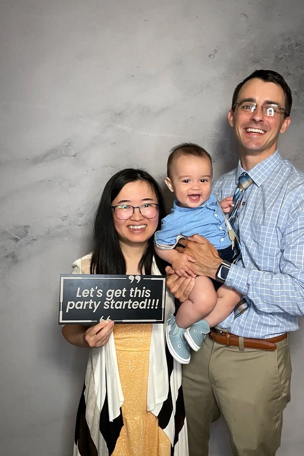 Wedding guests sharing a joyful photo booth moment at a Bay Area reception, image 1