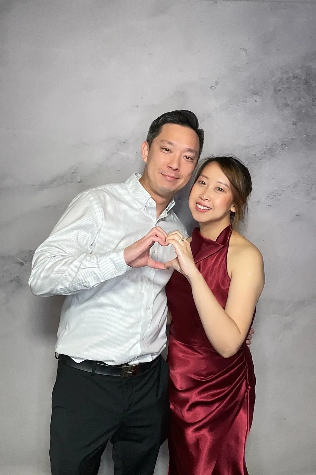 Wedding guests sharing a joyful photo booth moment at a Bay Area reception, image 10