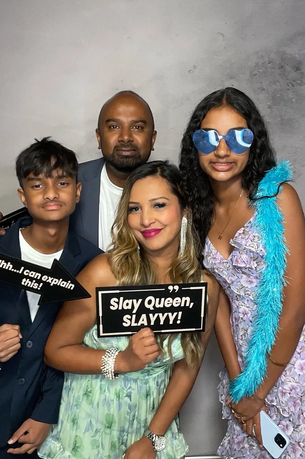 Wedding guests sharing a joyful photo booth moment at a Bay Area reception, image 12