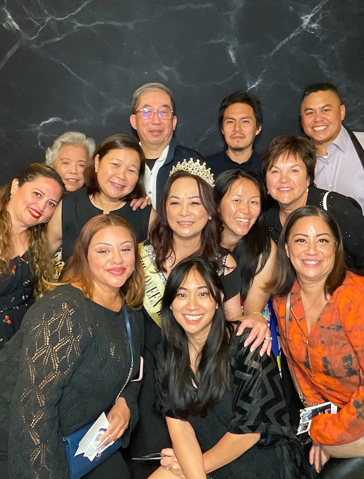 Large group portrait from a retirement celebration at Hilton Garden Inn in San Mateo
